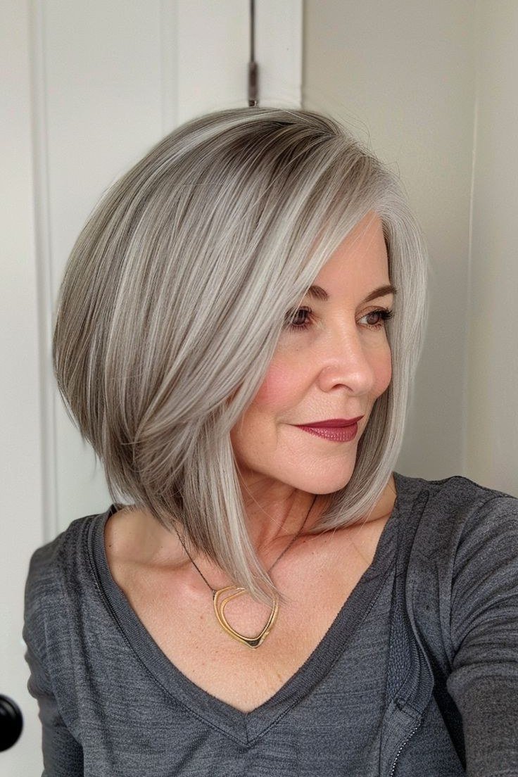 Angled silver-grey french bob with side part