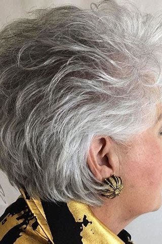 Grey voluminous feathered pixie, dramatic texture, side view for women over 60