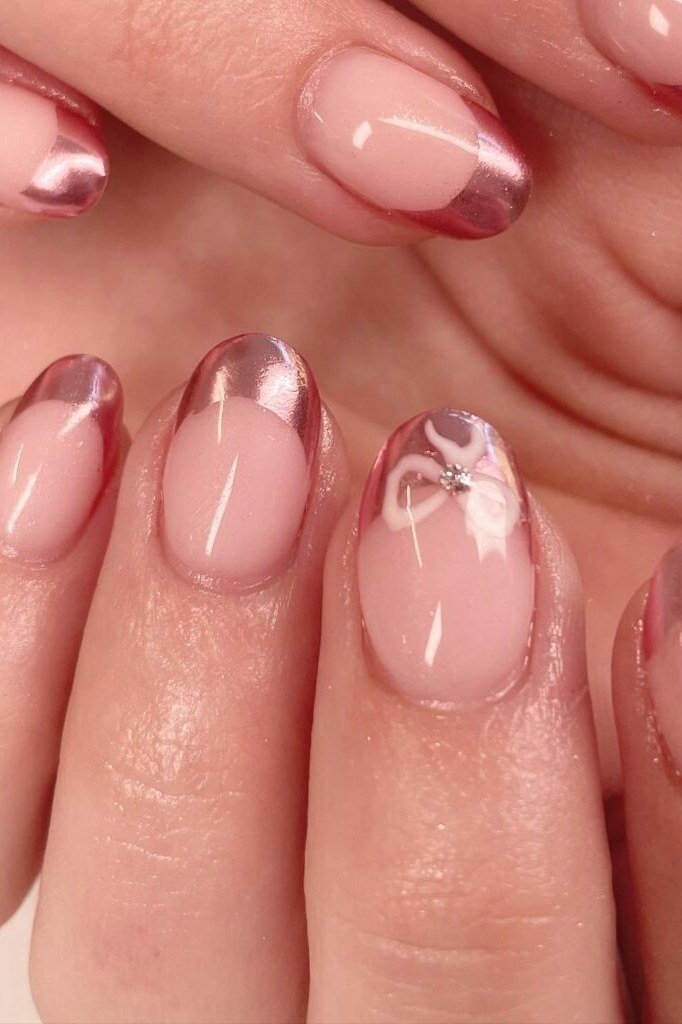French nails with pink metallic tips and bow art, best manicure idea for women over 60