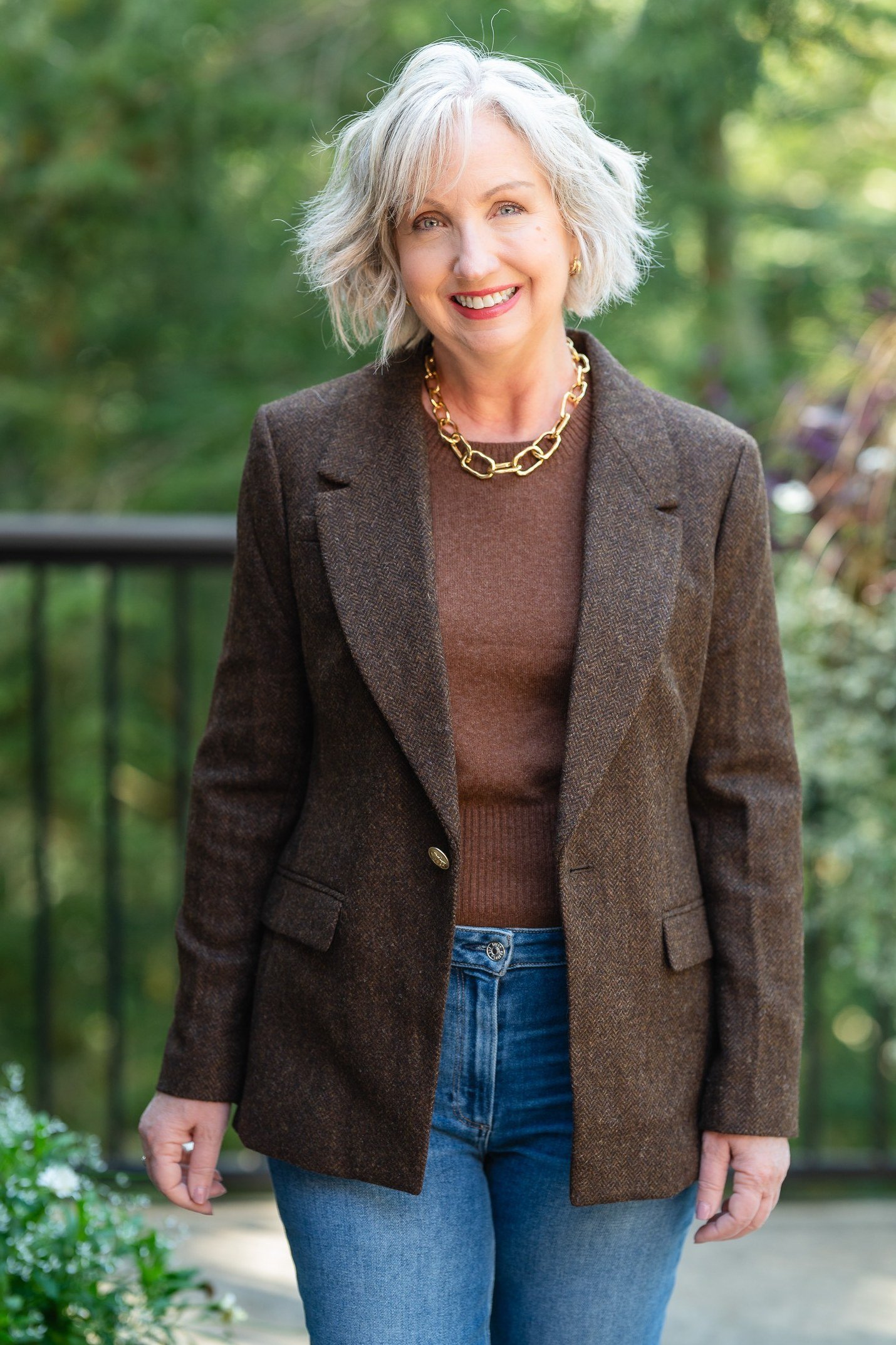 Brown blazer over chocolate knit with jeans for women over 60