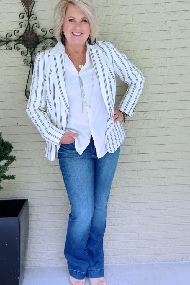 Striped Blazer with Medium-Wash Jeans - chic casual outfit for women over 50