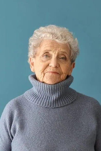 Short curly white crop on elderly woman, timeless hairstyle for women over 70