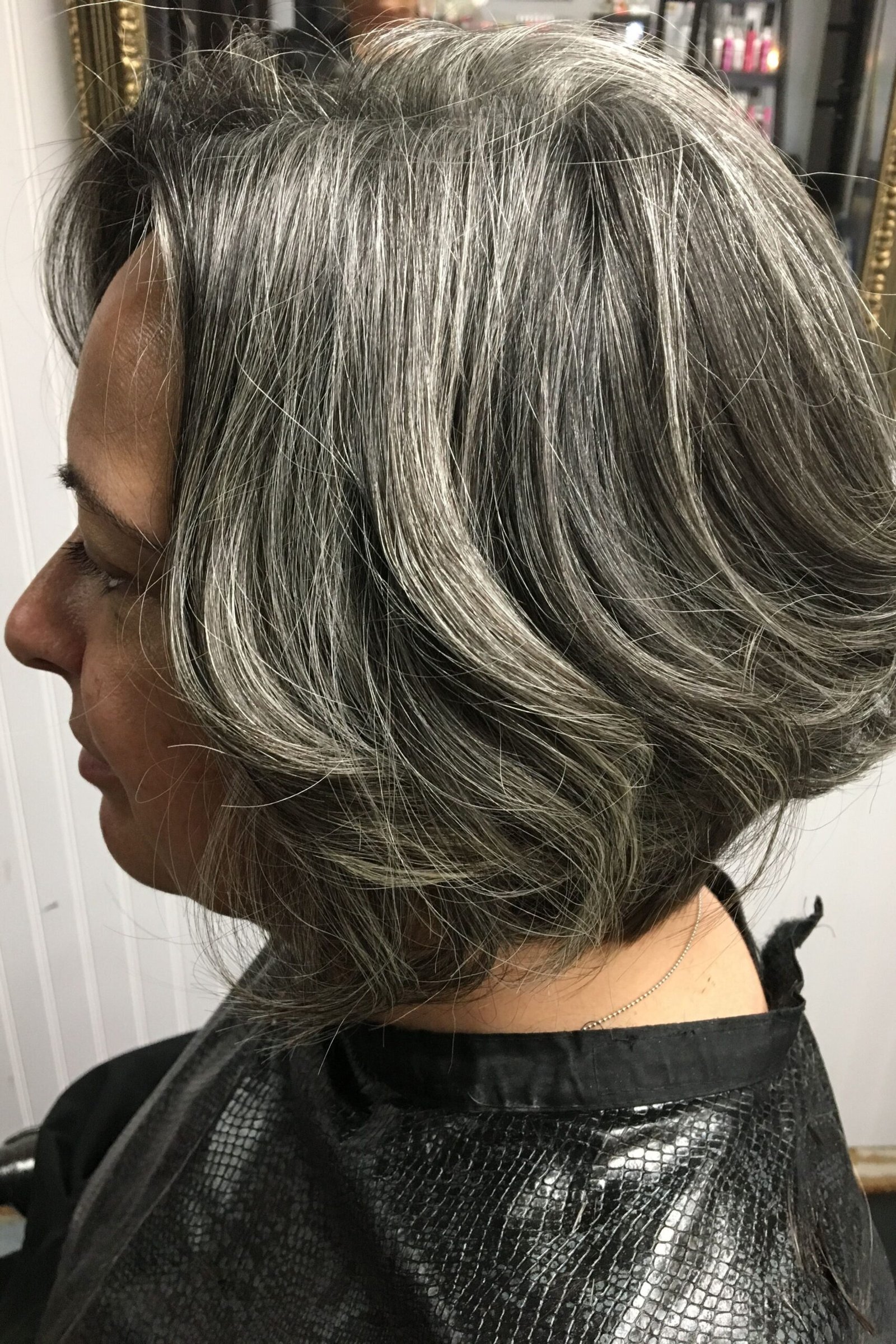Salt-and-Pepper Wavy Layered Lob - layered lob hairstyle for women over 60