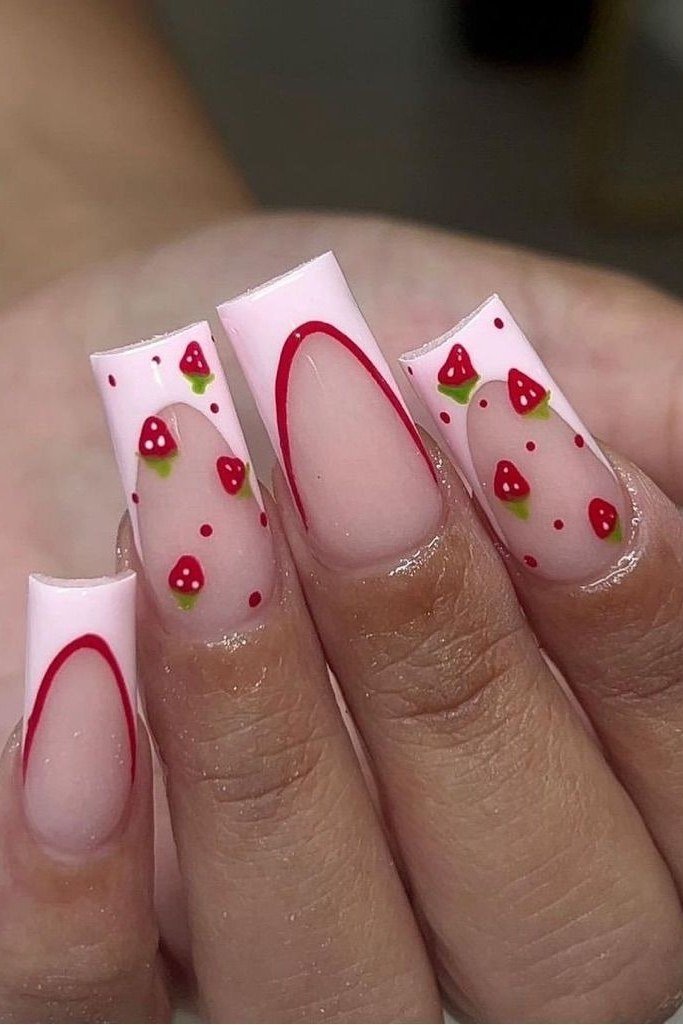 Square pink french tip nails with strawberry art