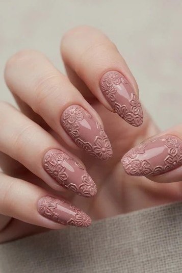 dusty rose almond nails with lace texture nail art
