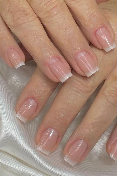 Nude square nails with french tips for women over 50