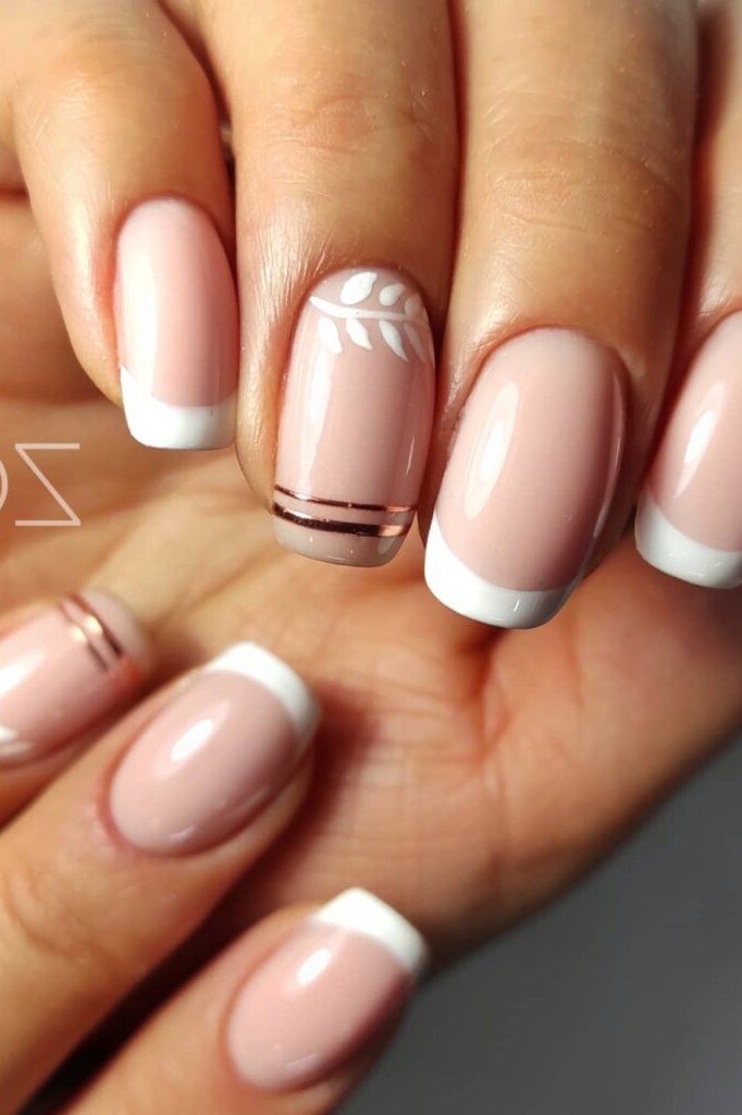 French gel nails with gold leaf line accents