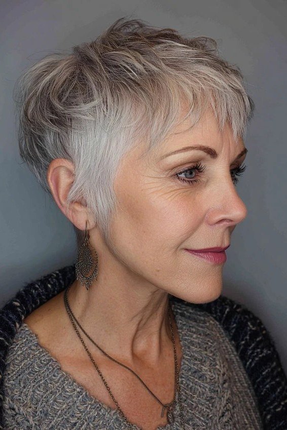 Silver pixie, profile view, micro pixie cut for women over 60 going silver