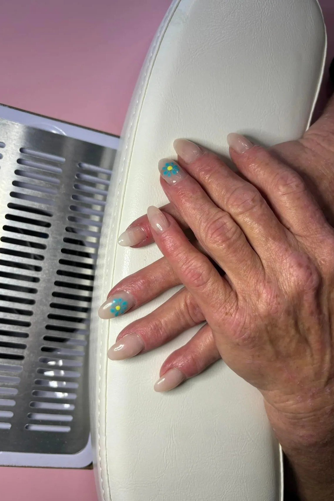 nude nails with tiny minimal art for older women