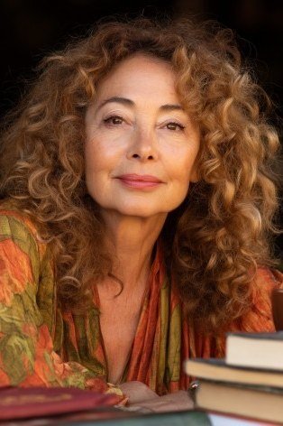voluminous auburn curly long cut, front view hairstyle for women over 70