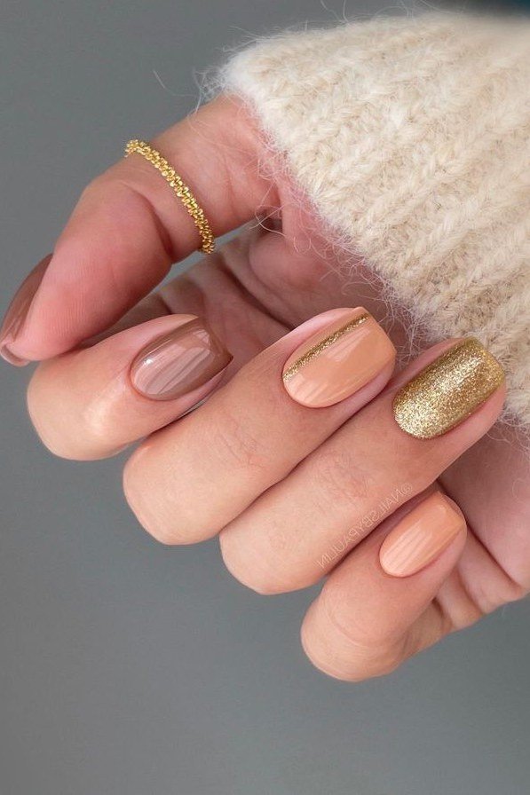 Nude with gold chrome tips - Christmas nail design for older women