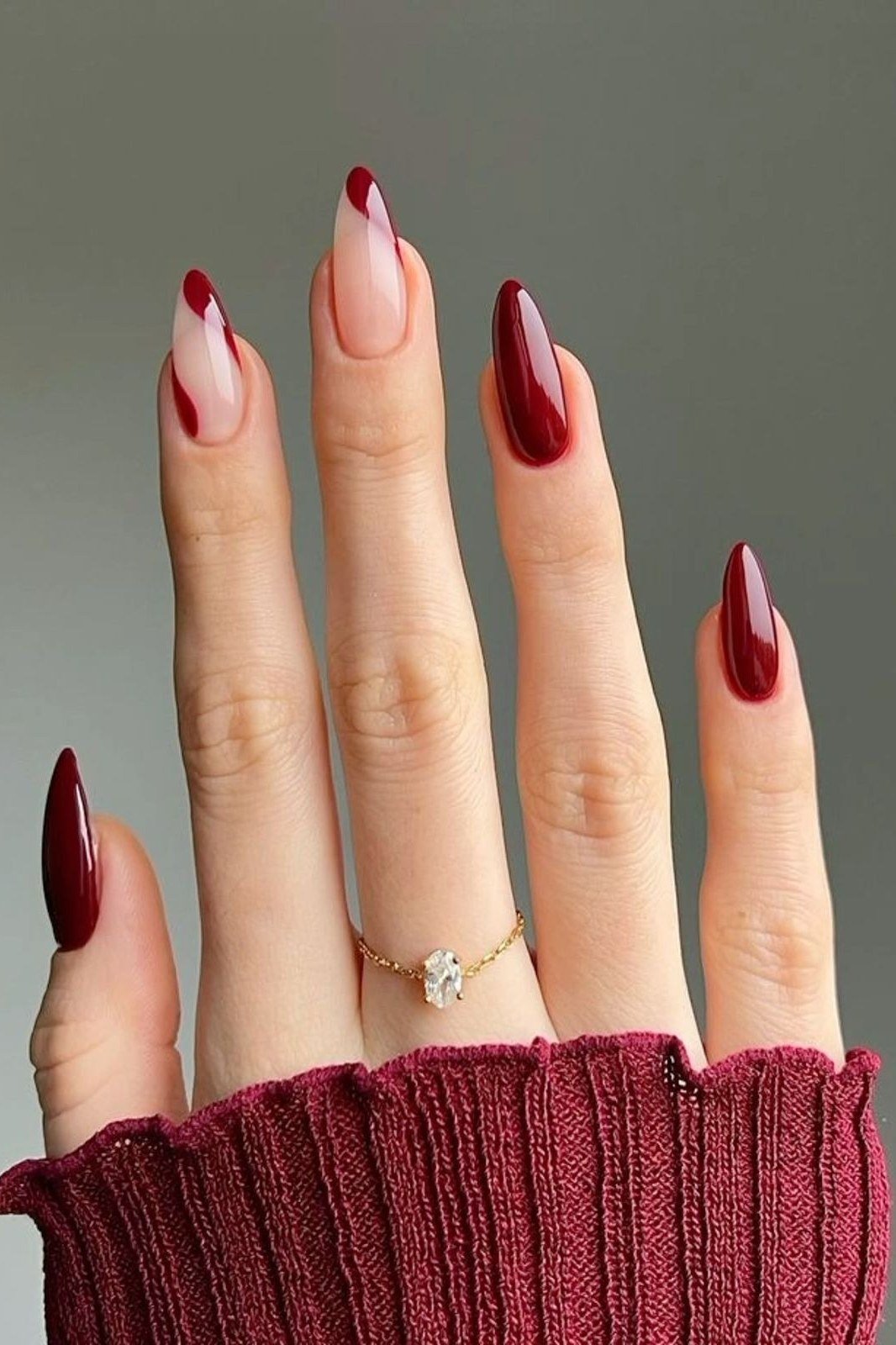 Nude nails with burgundy french tips for women over 50