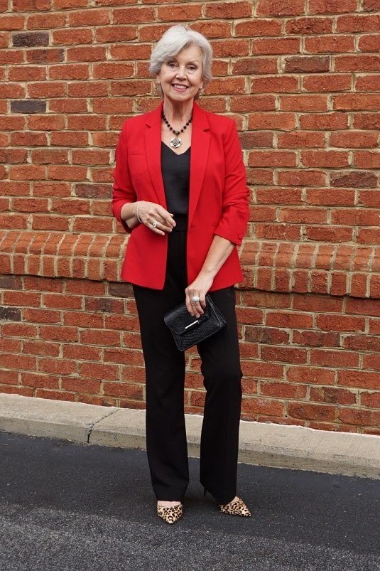 Cherry red blazer black trousers red blazer black pants 60s brick wall - fall outfit idea for women over 40