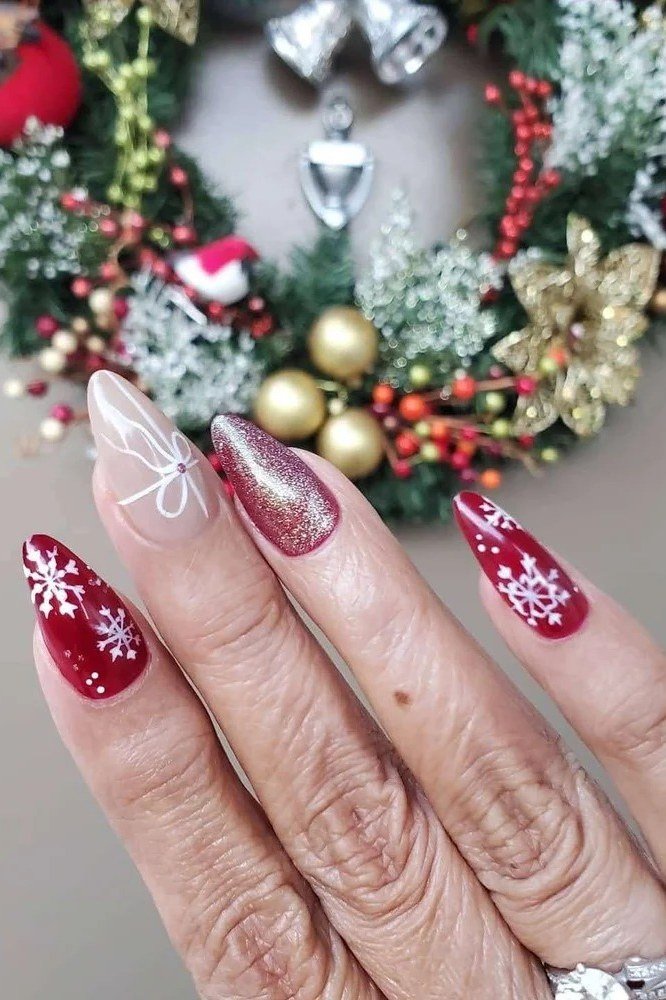 Red Snowflake Nails With Christmas Wreath - winter nail trend for older women over 70