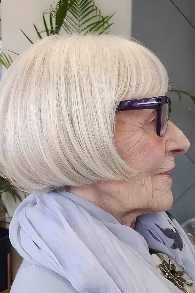 White Blunt Bob with Glasses - sassy hairstyle for older women