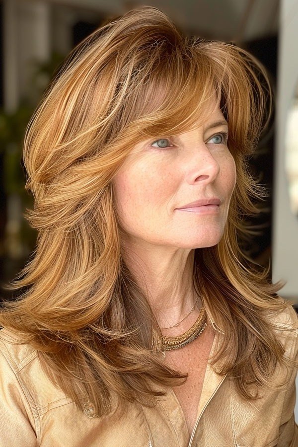 Copper Layered Lob with Wispy Bangs - medium hairstyle for women over 60