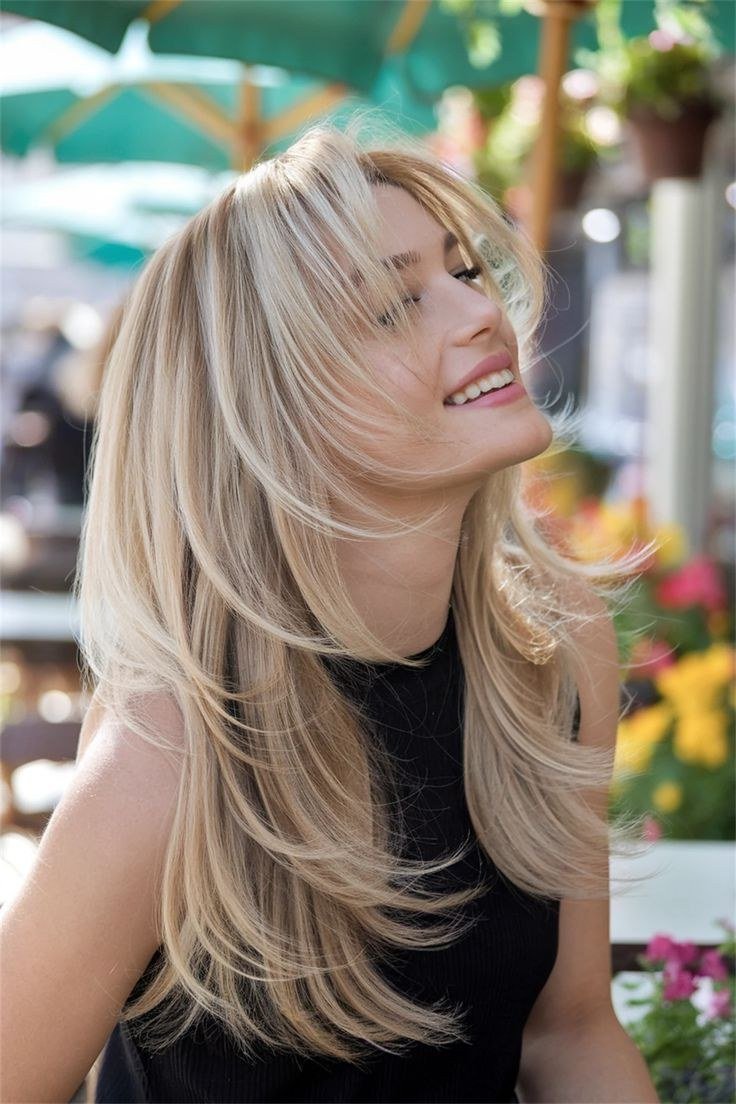 Outdoor Platinum Blonde Butterfly Layers - butterfly cut hairstyle for women over 60