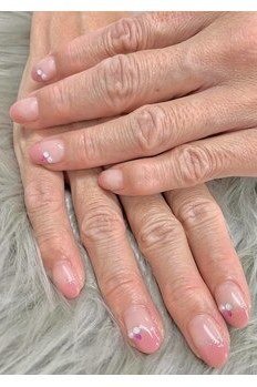 pink nails with tiny cute accents for older women
