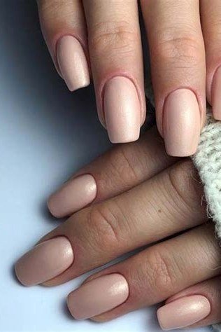 Nude oval nails with white knit sweater