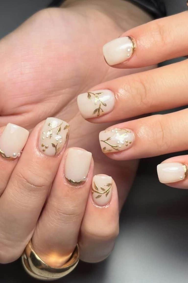 White with Gold Leaf Flakes - short nail design for women over 40