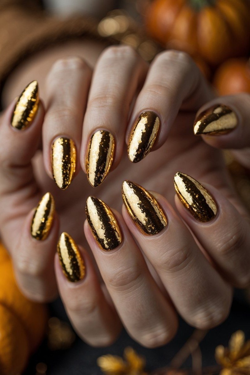 Gold chrome almond glossy, elegant fall nail design for women over 40