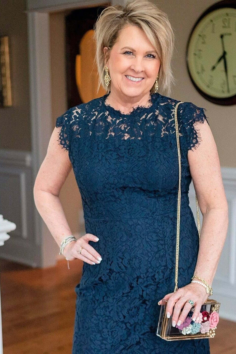 Teal Lace Dress With a Floral Bag - flattering outfit idea for women over 50, how to dress better over 50