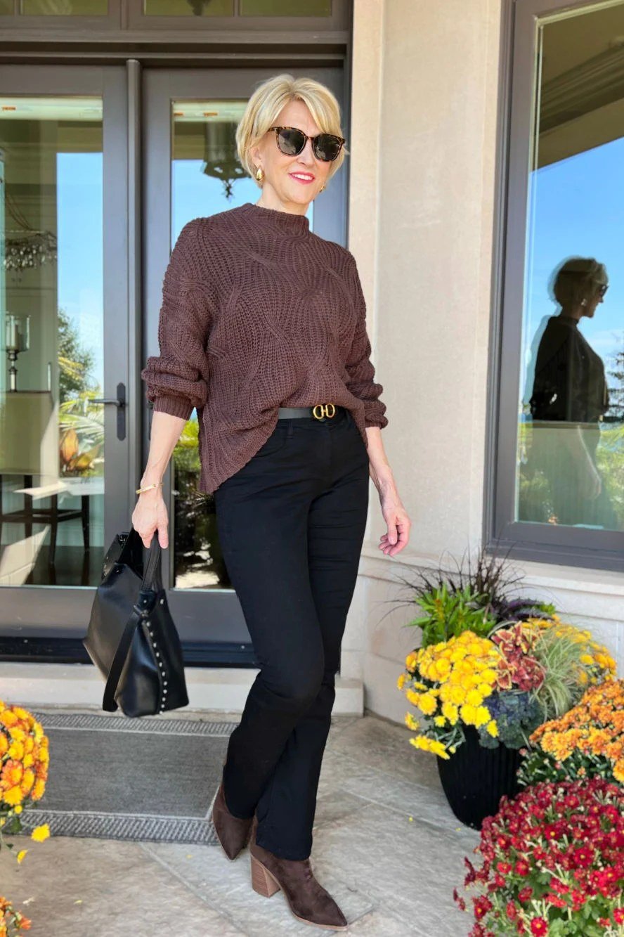 Easy casual outfit idea for women over 50: burgundy sweater and black pants, older woman everyday style