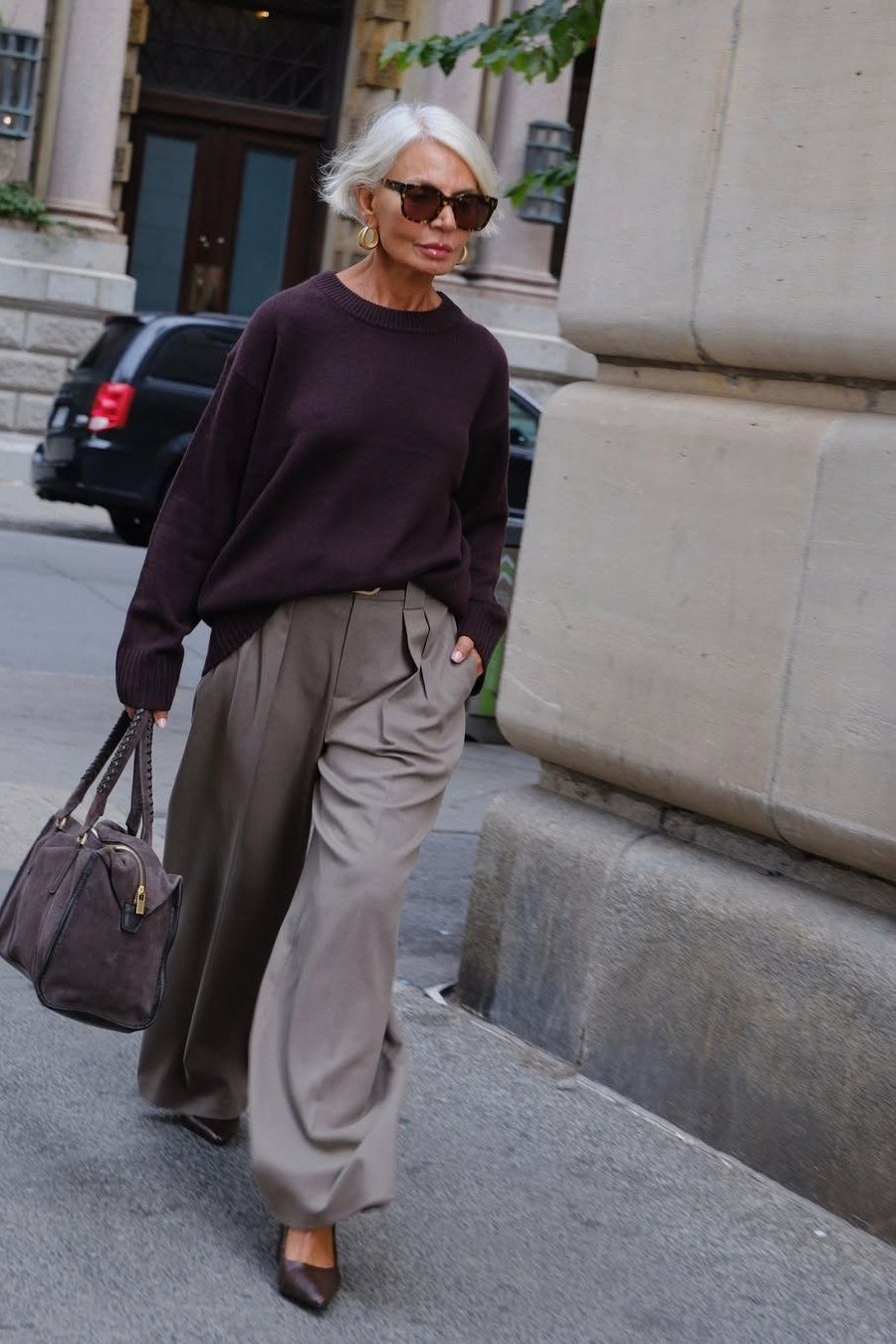 burgundy sweater and grey wide trousers fall outfit for women over 60