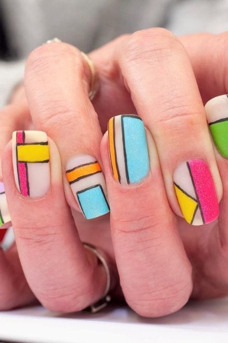 Nail art design for women over 60: colorful geometric nail art