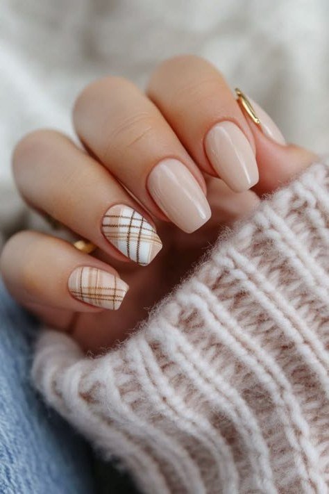 62. Nude Nails With Gold Plaid Accents - Thanksgiving nail art idea for women over 50