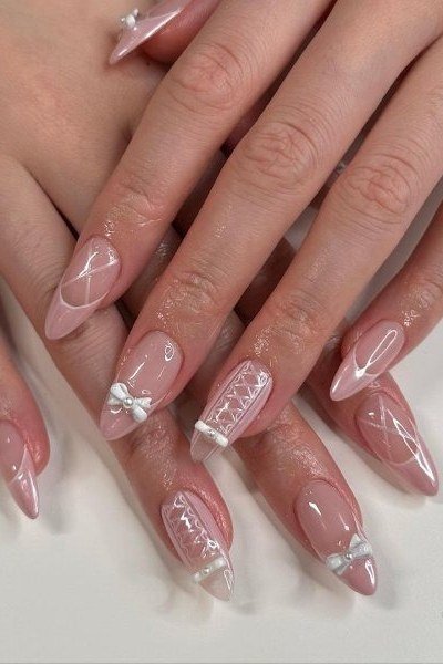 Almond translucent jelly nails with bow art