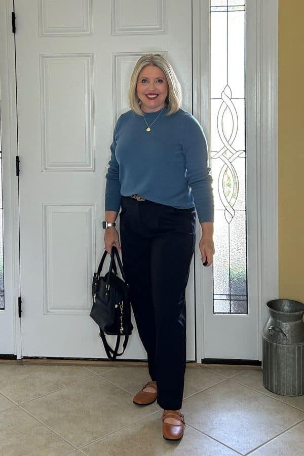 Blue Sweater with Black Trousers on a woman over 50, fall outfit idea