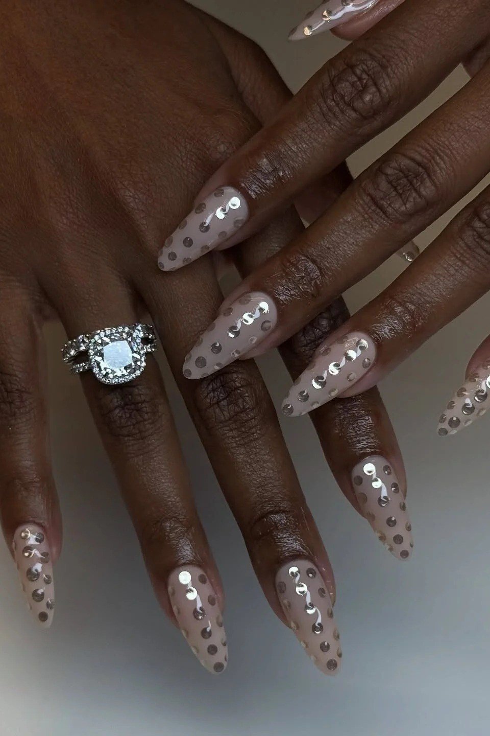grey taupe nails with glitter dots