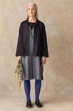 striped dress with blue tights and jacket for women over 60