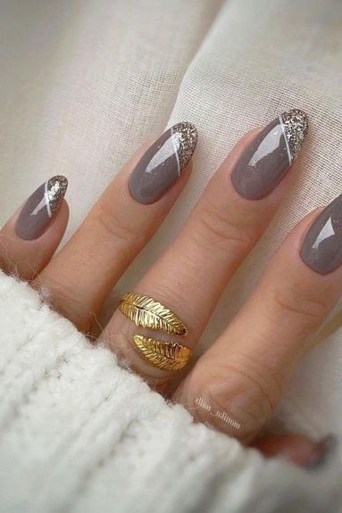 Greige solid with silver glitter french tips, almond shape, medium length, glossy, white sweater cuff, fall nail color for women over 40