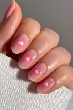 Pink Micro French with Hearts - elegant nail art idea for mature hands, women over 50