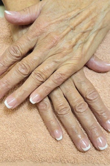 Classic French Tip Oval Nails - winter nail trend for older women over 70