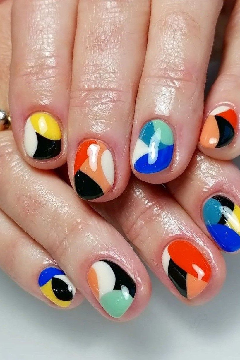 Nail art design for women over 60: colorful abstract nail art