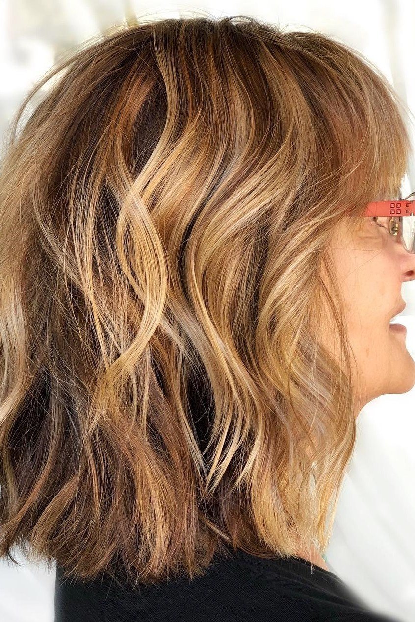 Caramel wavy lob haircut for women over 50