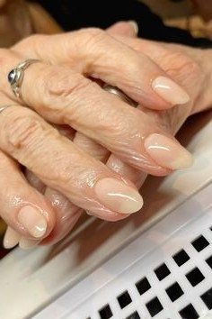 Natural Nude French Gel Nails - short gel nail idea for women over 50