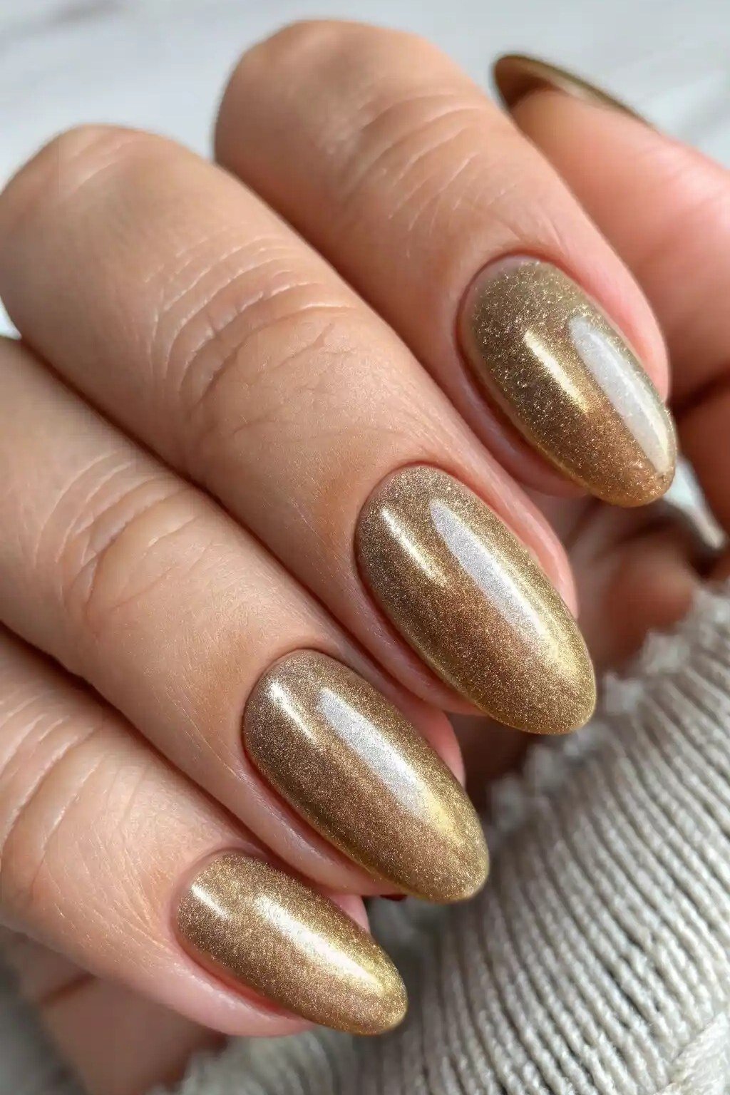Bronze chrome almond, elegant fall nail design for women over 40