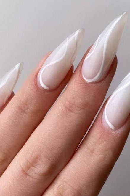 White Stiletto French Swirl - elegant nail art idea for mature hands, women over 50