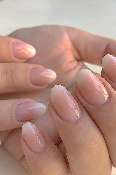 nude pink baby boomer fade on medium almond nails