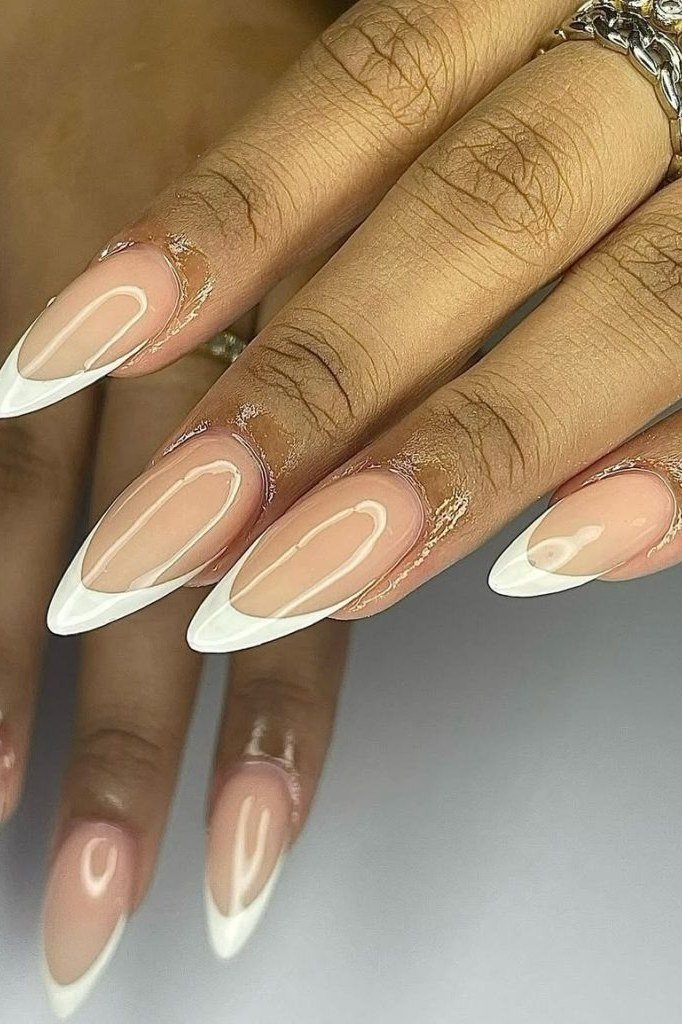 Almond nails with white outline french tips