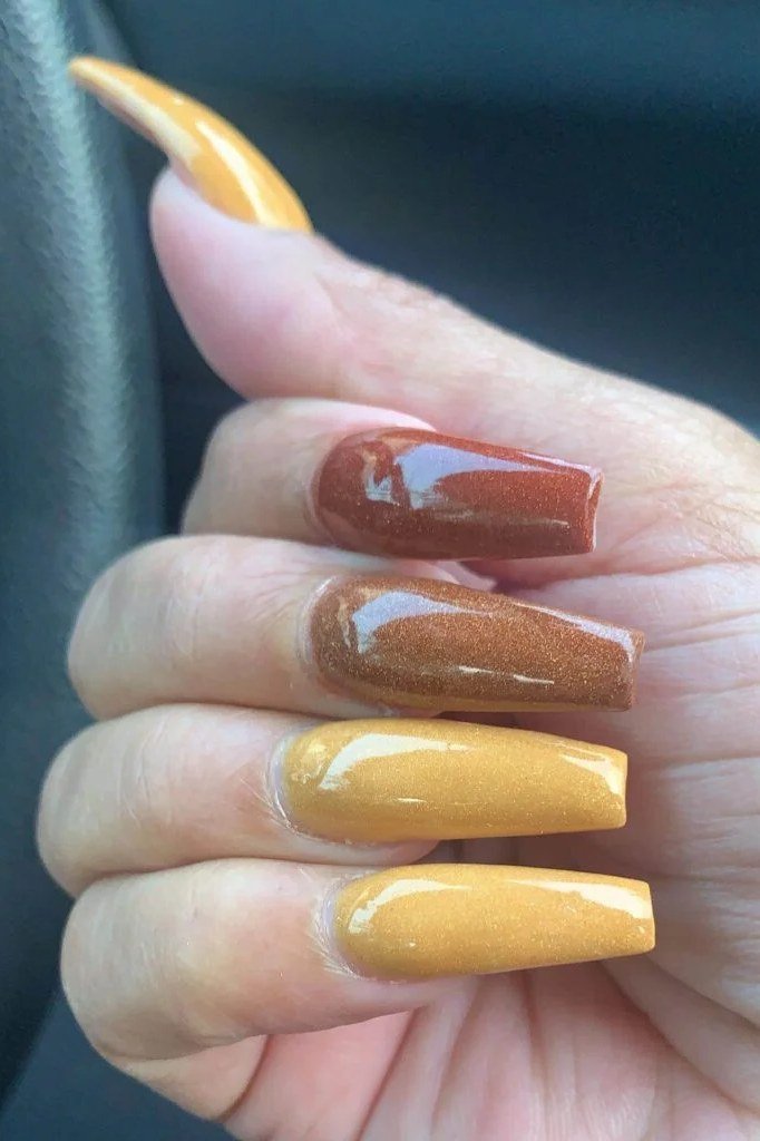 Caramel and mustard two-tone, long coffin, glossy, fall nail color for women over 40