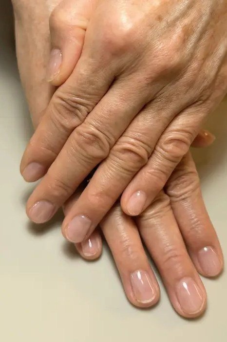 short oval, natural sheer nude, two mature hands , for women over 60