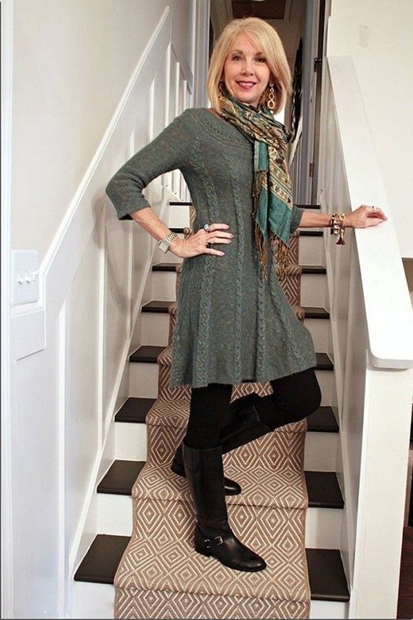 Grey-green knit dress with patterned scarf and black knee boots