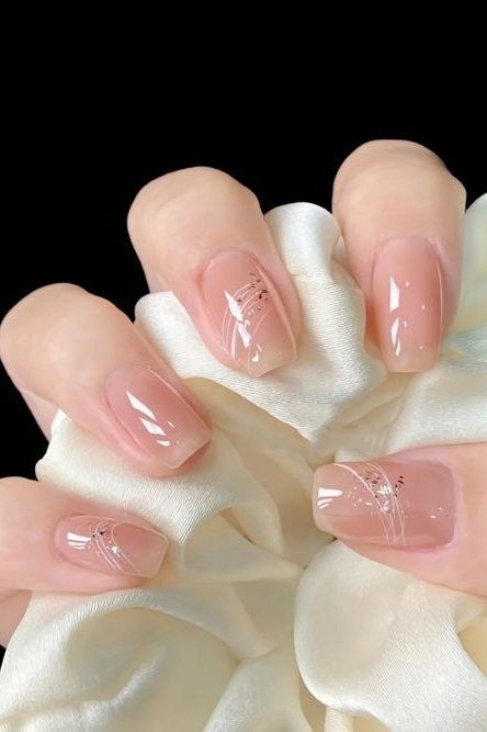 Silver Starburst Nude Nails - nude nail art idea for women over 40