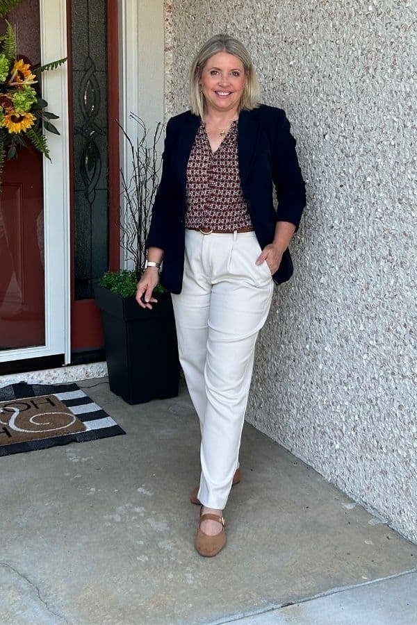 Navy Blazer with a Patterned Top and White Jeans on a woman over 50, fall outfit idea