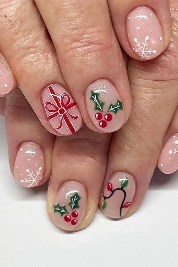 Pink/nude with holly and berry art - Christmas nail design for older women